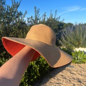 Summer hat with orange accent underneath